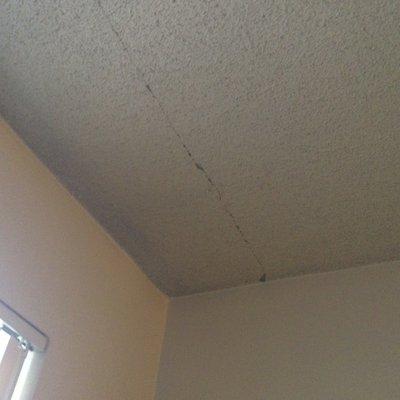 Cracked popcorn ceiling.
