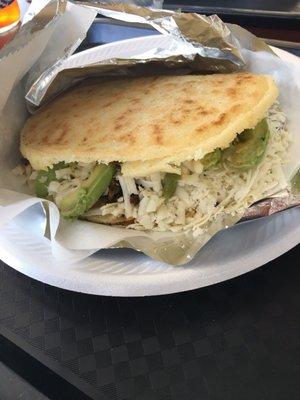 Yummy shredded beef arepa.