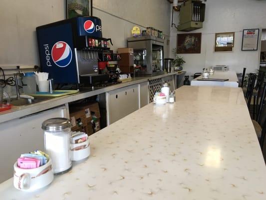 Sitting at the counter about to enjoy a wonderful linch.