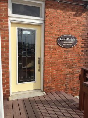 Entrance is in the back of the building