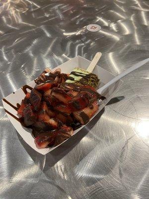 Pistachio with dark chocolate and pistachio nut and chocolate covered strawberries