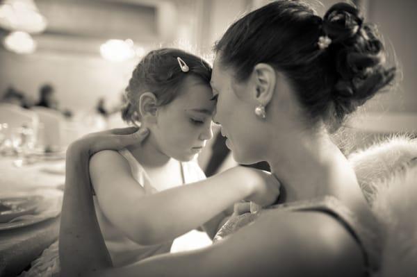 Mother & daughter moment captured at wedding, in a reportage style.