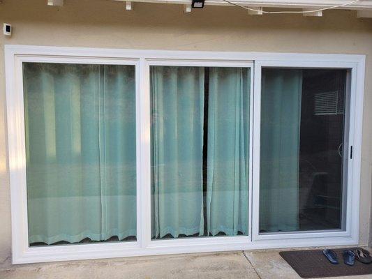 Large double pane glass sliding patio door