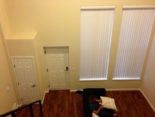 Tall ceilings make it impossible to hear and costs a fortune.