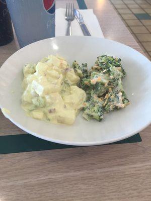 Potato salad and broccoli w/cheese shreds salad