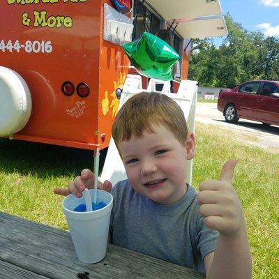 Wyatt enjoying a blue coconut sno cone