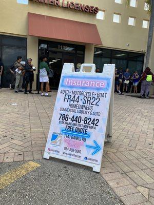 Info for the tag and insurance agency that Ryan Sintay runs next to the Margate DMV.