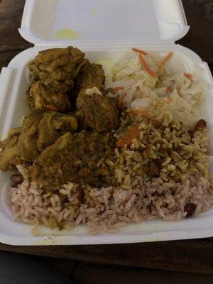 Curry chicken, Rice &peas, steamed cabbage..... So good! Real Jamaican Food! Check them out.