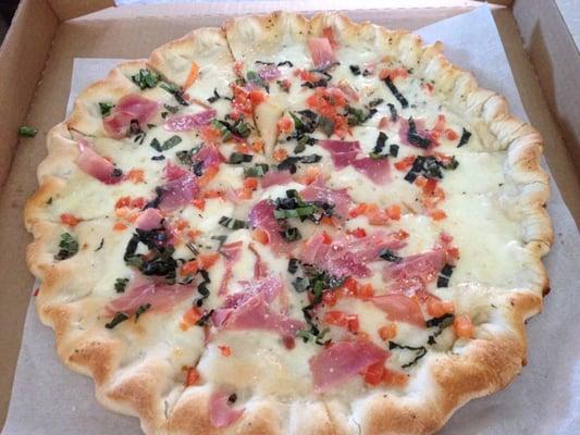 Prosciutto Mozz Shallot butter, fresh mozzarella, prosciutto, roma tomato, fresh garlic, fresh basil, romano cheese