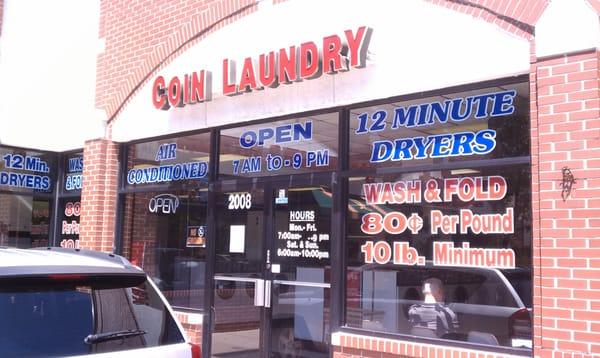 Front of the Laundromat with hours, prices, etc. (7-4-11)