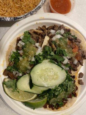 Side of rice. Al pastor, steak, beef tongue tacos.