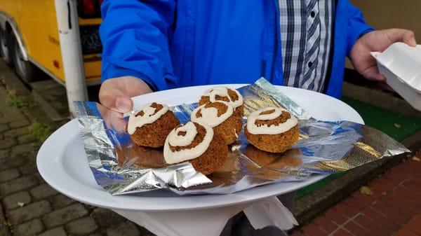 falafel with some hummus on top