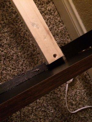 Nail was screwed too close to edge of railing and splinted the wood, they actually had the nerve to blame this on my cats!