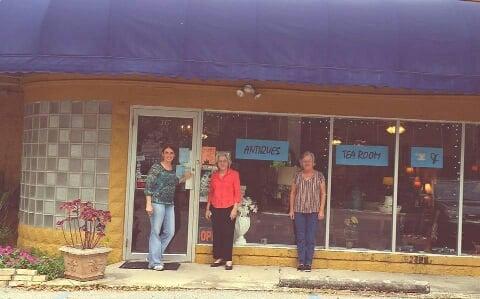 Missy Geisel ,Sylvia Young, Dixie Whitehead in front of Antique Maison Ulman Tea Room