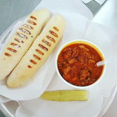 Hearty chili with cubed sirloin and bread stix