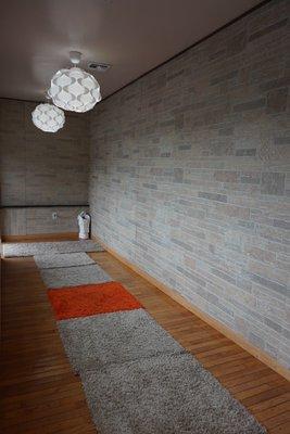 New entrance with new lights & rugs!