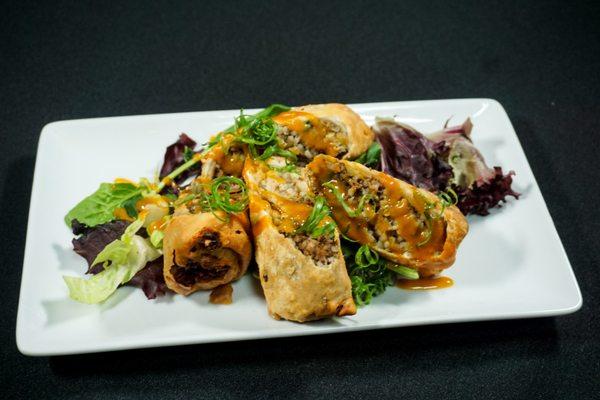 Boudin Egg Roll
Ethiopian spiced ground beef and rice stuffing , drizzled with honey 24k house sauce