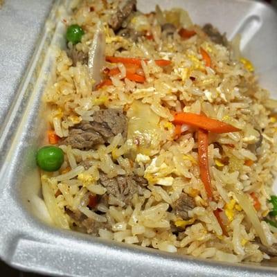 Rainbow Fried Rice: Egg, Pineapple, Spanish Onions, Peas & Carrots.