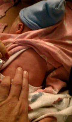 Dr. O'Hara checking my newborn son's spine!