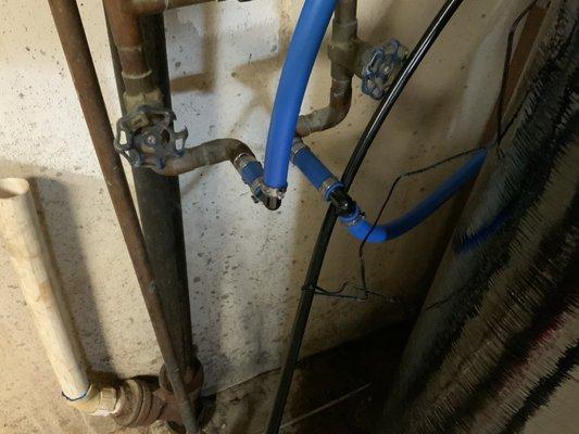 Cut off faucet ends and installed blue tubing with black elbows everywhere.