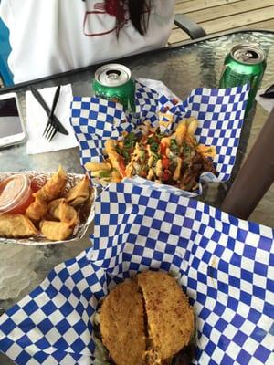 Oh My Gogi Fries, Fried Dumplings, and Ramen Burger.