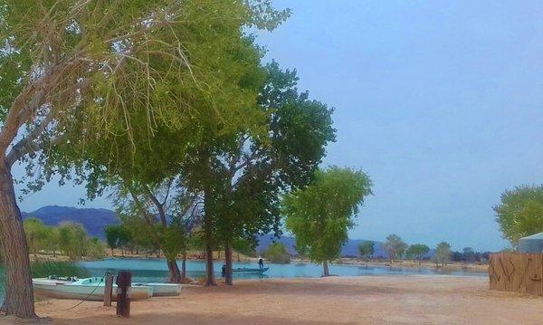 Own this 15 Acre Private Ski Lake! Fishing, swimming, water ski and wake board, jetskiing, ATV's, and more. 8 RV Spaces. 33 Fenced Acres.