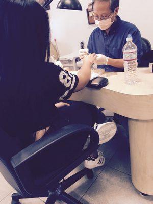 Peter doing my nails