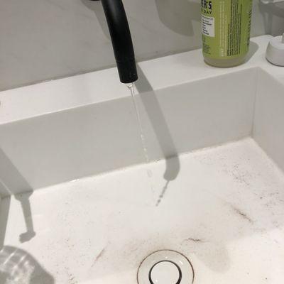Bathroom sink water (week 1 in my new apartment). Sad face.