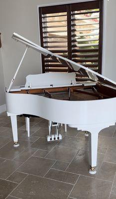 Baby grand white piano Disklavier