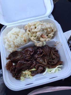 Teriyaki beef to go. I asked for 2 scoops of macaroni salad instead of the normal two scoops of rice. So good!