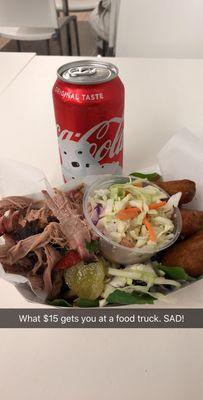 The soda was $2. The dry pork, slaw, and mac & cheese bites were $13. Eek.