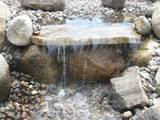 Landscaping, Water Features, Retaining Walls, and Paver Patios.