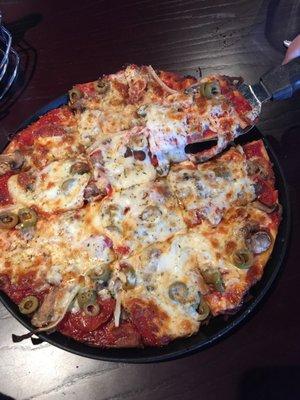 Don't special order your toppings, just substitute! We subbed green for black olives on one of the specialty pizzas.