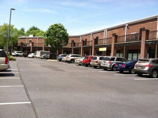 Located on the back, lower level of Hope Ferry Center (behind McAlister's Deli). Follow the road to the back. Plenty of curbside parking.