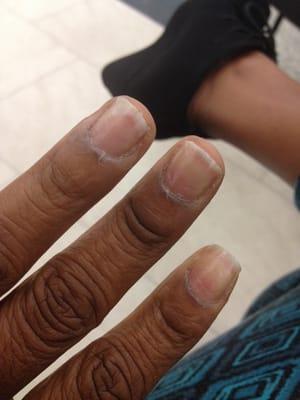 My names look worse now than when I came in. Look at the cuticles and uneven nails plus bad job in just the clear polish.