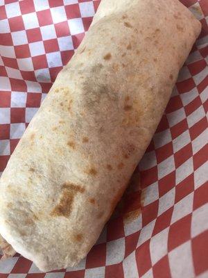 Pork burrito with red sauce. Fiery!