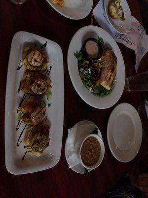 Beet salad with added grilled salmon on top, shrimp bruschetta, a side of beans-- all really good!!