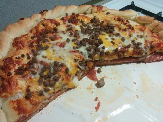 Family sized all meat stuffed pizza.  Huge 2" tall!