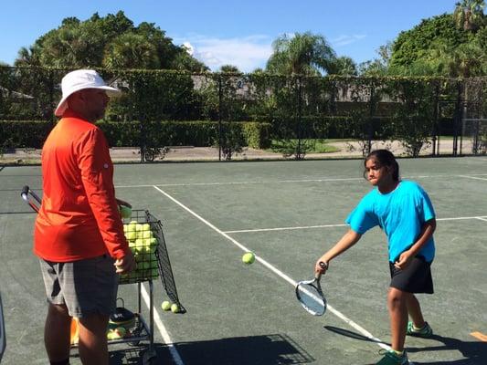 Coach Perdomo working with the future champs.