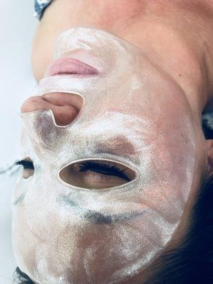 One of our beautiful clients enjoying her collagen facial!