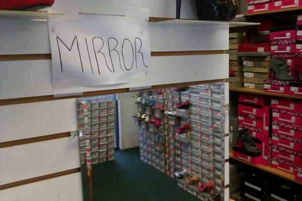 Signage for "Mirror."