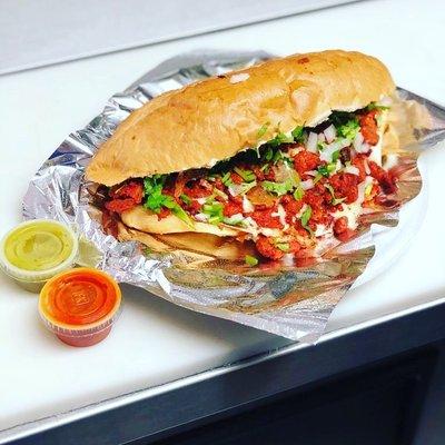 Customer's favorite! Torta al pastor with a cheesy finish!