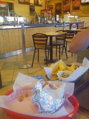 Mondo burrito with chips and salsa.