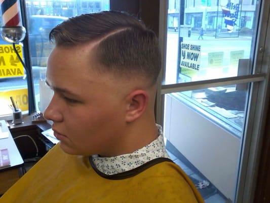 Bald Fade with Hard Part by Steve.