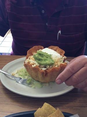 Taco Salad. Awesome guacamole and filled with veggies, meat and beans as well as lettuce.