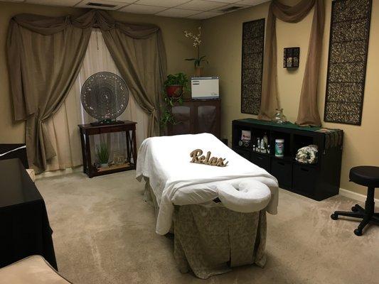 Massage room. Relax while you receive a therapeutic massage.