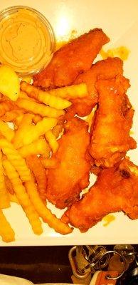 Medium wings, fries, with their signature sauce for dipping