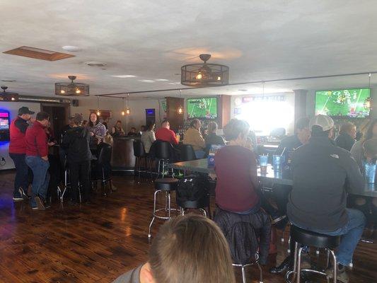 Busy bar on a Saturday noon