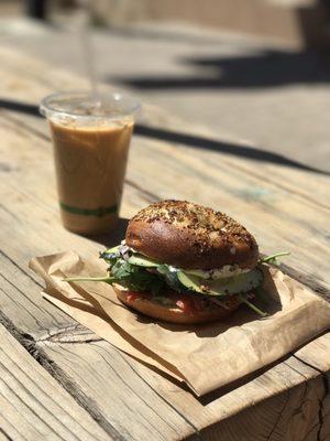 Custom bagel sandwich and cold brew coffee.
