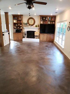 Concrete overlay with custom stain for a beachy look